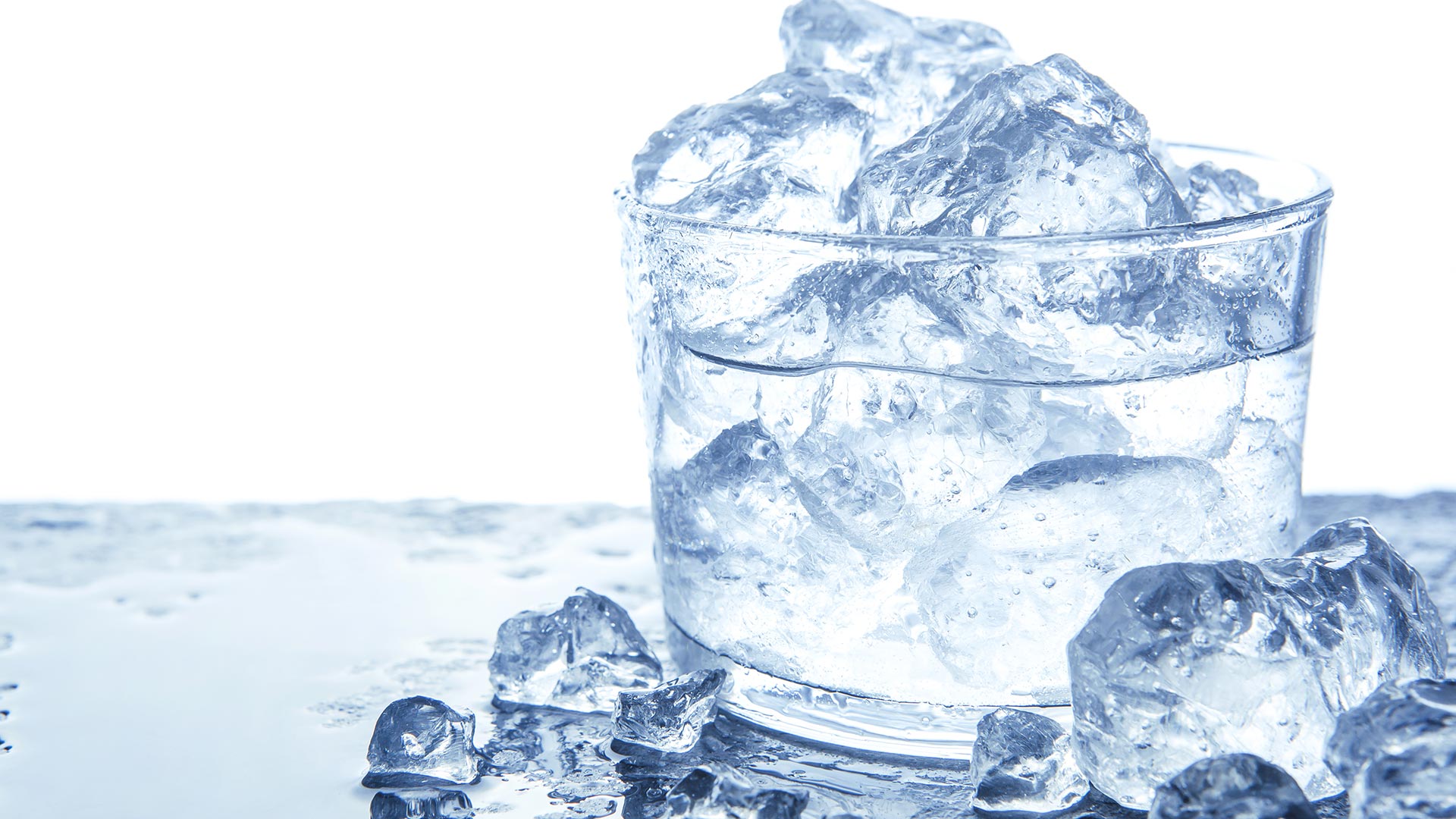 glass of ice water, representing very cold water for sensitive teeth